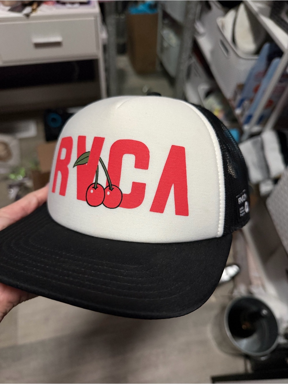 Rvca women’s trucker hat.